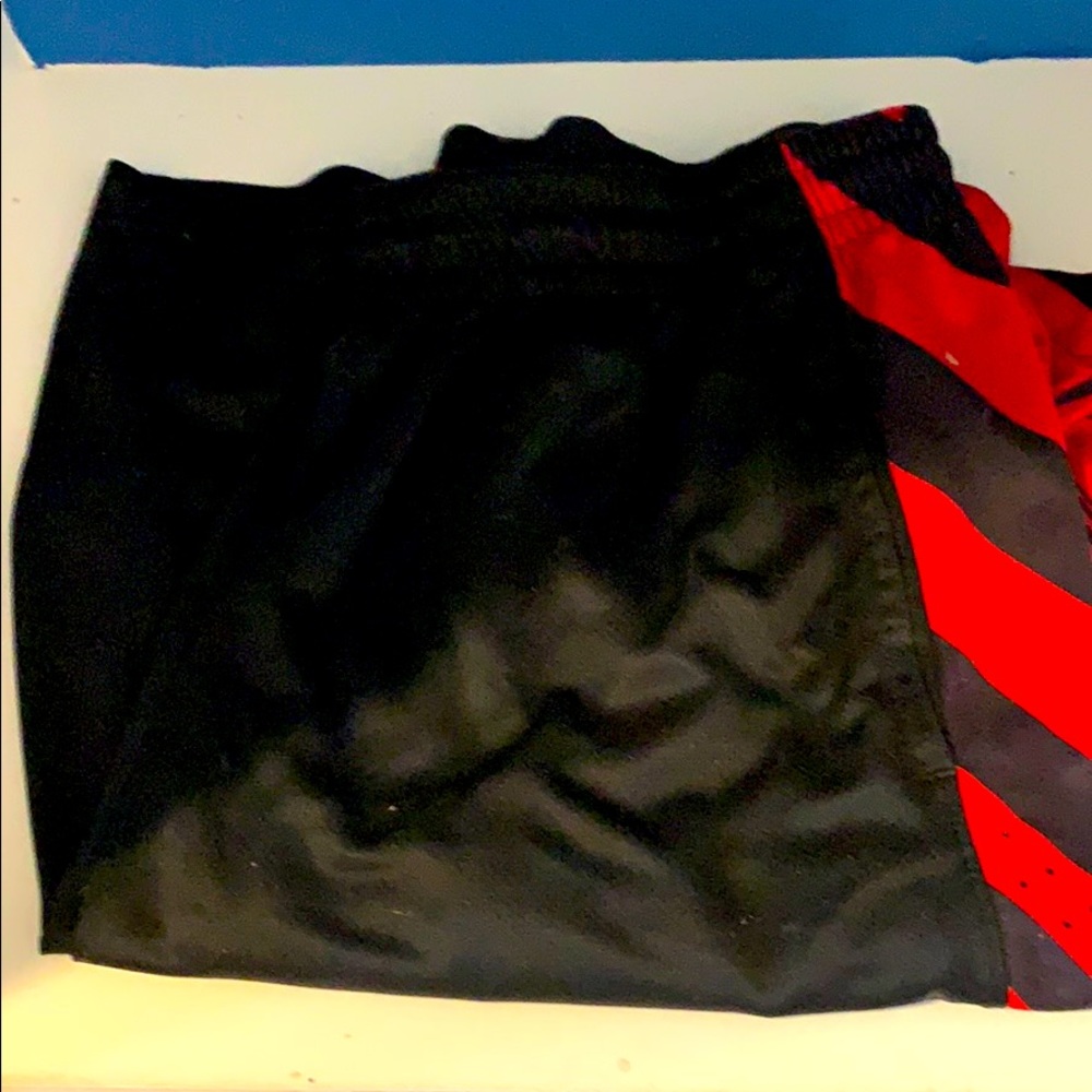 Black and red men’s Nike long shorts